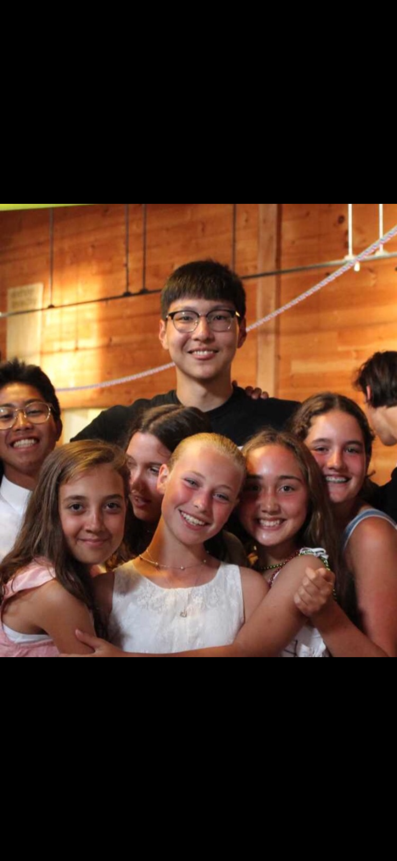 Anar surrounded by campers at Windridge, Vermont